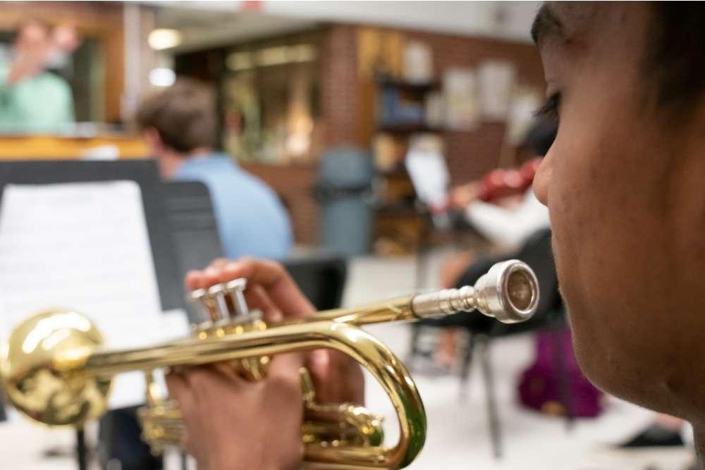 student playing trumpet