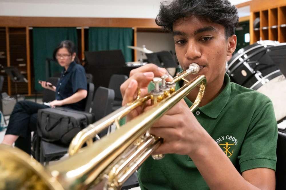 student playing trumpet