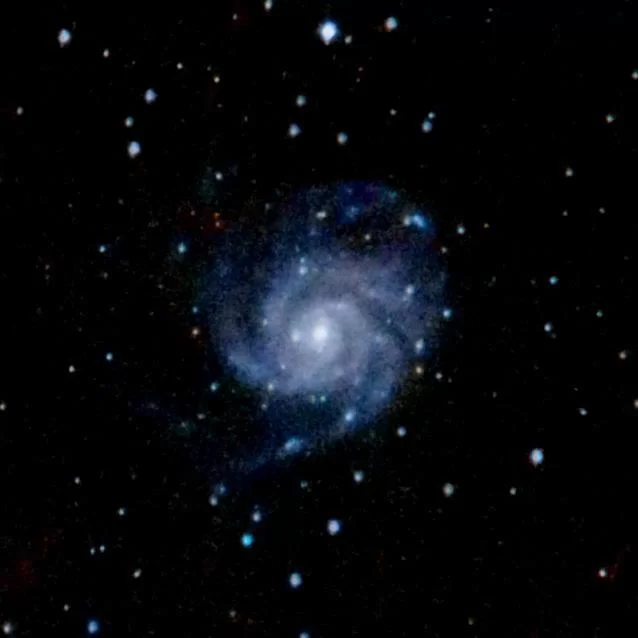 Figure 6 | The Pinwheel Galaxy (M101). Photographed on 4/7/2021 from Flanders, NJ, using a Canon EOS RP with a Sigma EX DG OS 70-200mm f/2.8 lens and a 2x Sigma APO Teleconverter at f/8, and ISO 3200 on a Sky-Watcher Star Adventurer 2i Pro tracking at sidereal rate. The rig was used in full-frame mode for a total raw focal length of 400mm. 37x120s images were integrated within Sequator for a total of 1.2h of data; the output TIFF was then stretched in Adobe Photoshop CC v. 22.1.1 using the Astronomy Tools Action Set (v. 1.6.2 from ProDigital Software) and AstroFlat Pro (v. 1.4.11 from ProDigital Software). 