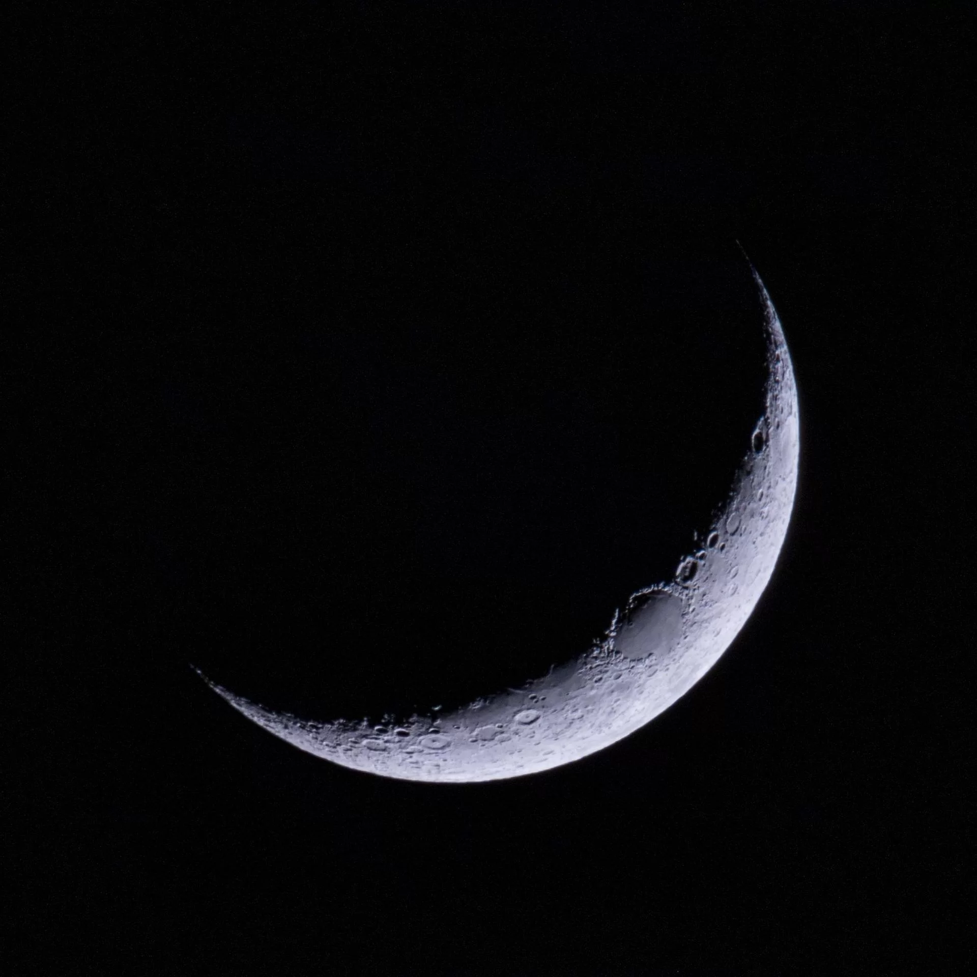 Figure 16 | Crescent Moon. Photographed on 1/5/2022 from Flanders, NJ, using a Canon EOS RP with a Sigma 150-600mm DG OS HSM f/5-6.3 lens and a 2x Sigma APO Teleconverter at f/13 in cropped-sensor mode for a total raw focal length of 1920mm. It was a single full-frame exposure for 1/6s on a filtered sensor (Kase Neutral Night Light Pollution Clip-In Filter) at ISO 200. The image was cleaned up in Adobe Lightroom CC. 